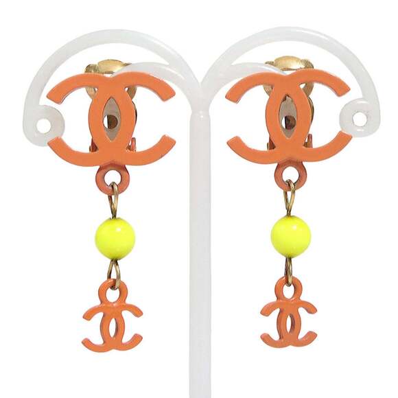 Chanel earrings Coco Mark design metal enamel orange and gold for women. ...